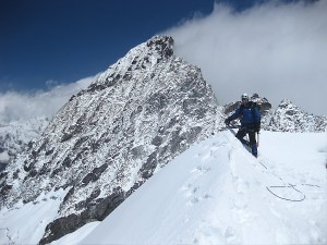 Paul on summit of lama lamani with jopuno in background 2